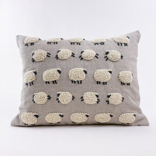 Load image into Gallery viewer, This beautiful pillow with embroidered and applique sheep is perfect for a nursery or child's bedroom. Evocative of Princess Diana's iconic sheep sweater from Rowing Blazers, it could also add a touch of whimsy to any living room.  Material: 100% cotton. Sold with insert. Dry clean only.  Dimensions: 12"x16"