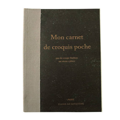It all began with antique books encountered at a flea market in Paris… During a trip to Paris, the discolored paper and unevenly worn corners and edges of the antique books captivated the designer of this tiny notebook.  Dimensions: 5