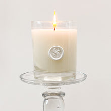 Load image into Gallery viewer, Our beloved Signature Scented Candle is made locally from all natural soy coconut wax with no synthetic oils added.   Details: 13.5 oz tumbler featuring our logo wax seal detail
