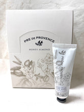 Load image into Gallery viewer, Our rich and luxurious hand cream is full of organic shea butter and sweet almond oil, creating a fast absorbing, weightless moisturizer that envelops skin with nourishment. Product of France.   Size:   1 Fl. Oz / 30 Ml
