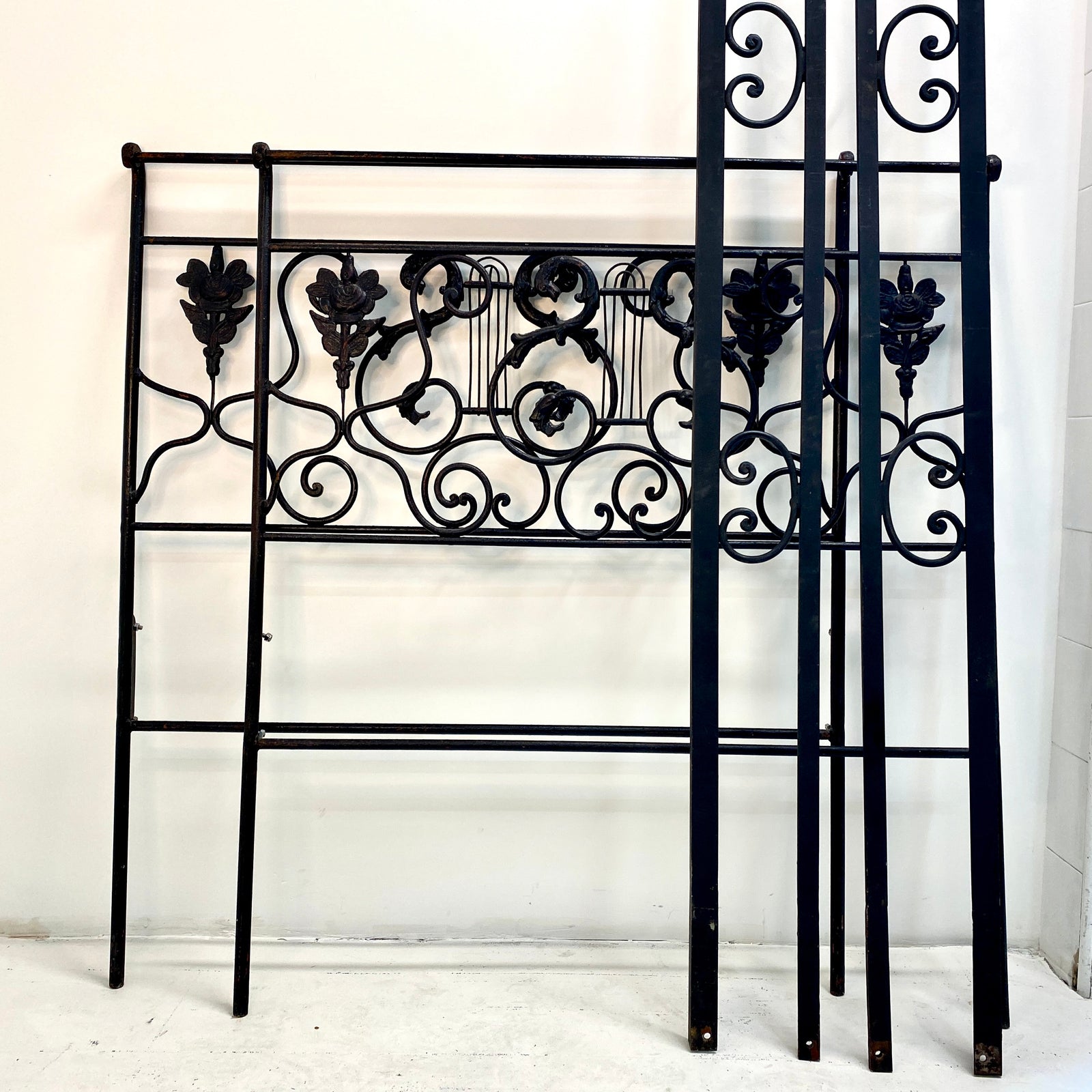 Realize your Riviera decor dreams with this beautiful French daybed frame. Includes a footboard identical to the headboard and side rails with matching adornments.   Pick up or local delivery only. Come by the shop to see this one-of-a-kind piece in person!   Dimensions: H 29" x W 75" x D 44". Interior will accommodate a twin-sized mattress. Iron