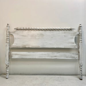 This antique custom-build bedframe evokes the peace and simplicity of country-style decor. Includes a footboard identical to the headboard and matching wooden side rails.   Pick up or local delivery only. Come by the shop to see this one-of-a-kind piece in person!   Dimensions: H 37.5" x W 71.5" x D 50.5". Interior will accommodate a 3/4 sized mattress (between a full and a queen) Wood
