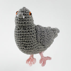 This crochet cotton pigeon baby rattle is fair trade and handmade by skilled artisans in Bangladesh. A perfect gift for a New York baby.  Suitable from birth, machine washable.  Material: Cotton crochet with polyester fill.   Dimensions: 13cm x 9cm
