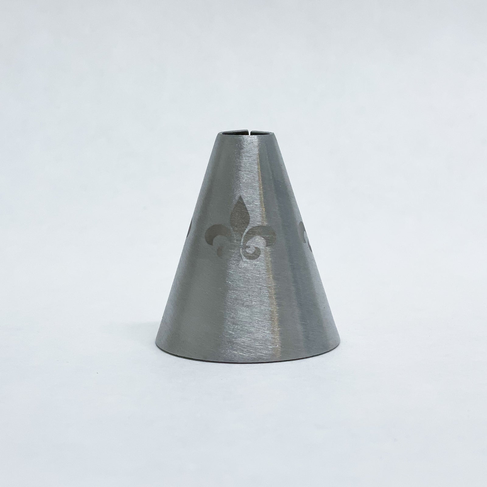 A wonderful tapered candle shaver with a fleur de lis decoration. A taper candle shaver is used to ensure your candles fit perfect to your candle holders. 