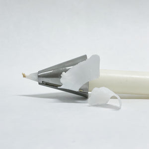A wonderful tapered candle shaver with a fleur de lis decoration. A taper candle shaver is used to ensure your candles fit perfect to your candle holders. 