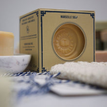 Load image into Gallery viewer, Made of vegetable oils, free from artificial colourings, fragrance and chemical products, our cube of white Marseille soap is recommended to wash all textiles gently, in particular delicate items (baby clothes, fragile fabrics…).   It is also very efficient on resistant stains.
