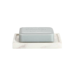 Beautifully handcrafted in India by skilled artisans, the Belle de Provence marble accessories are made from white marble with natural purple and grey veins. A luxurious accent for your home! A stylish piece to hold and display your favourite bar of soap.  Dimensions:  5.5"x 3.5"x 0.75"  *Marble is a natural stone and each piece has unique variations.
