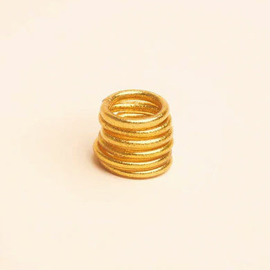 Vinyl ring filled with 24 karat gold leaf, sealed with a prayer of protection and sacred oils. Often worn in even numbers, in sets of 3, 5, 7, or 9, for a beautiful statement and to bring good luck.  Kumali jewelry is light, flexible, comfortable, waterproof, and resistant to time. The perfect summer-proof (and shower-proof!) staple.