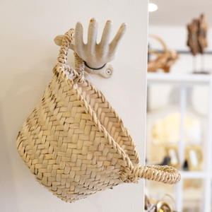 Petite in scale but true to life in shape our cast iron hands are sold separately by the left and the right. With a simple 2-screw wall mount the hands may be hung securely in countless positions.     Dimensions:  Length: 3.25 inch.   Height: 5.50 inch.