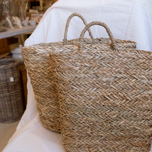 Wonderful wall baskets, great for storage while keeping your decor looking put together.  Two sizes to choose from:  Small -  14-1/2"L x 6-1/4"W x 13"H  Large- 16"L x 8-3/4"W x 13-3/4"H 